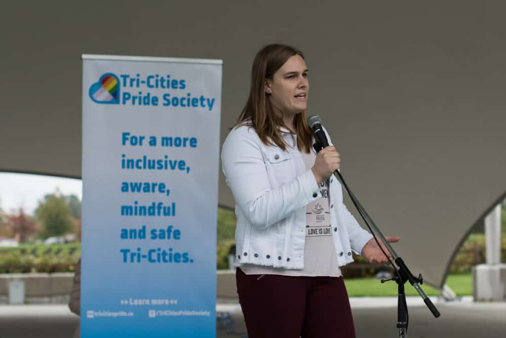 A photo of Nicola Spurling, TCPS founder, speaking at the rally for SOGI & SOGI 123.